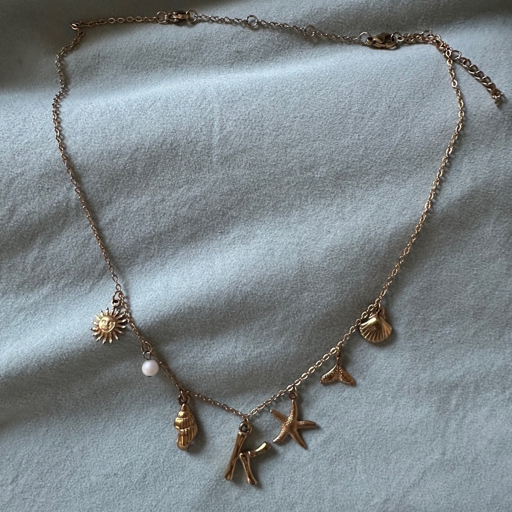 Gold Charm K Coastal Necklace